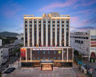 enjoy inn Wanning Hotel - Wanning - Budova