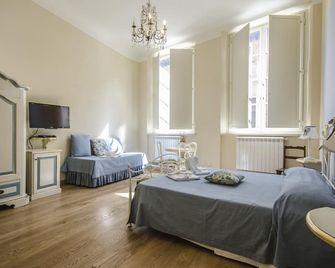 B&B Anfiteatro - לוקה - חדר שינה