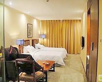 Lvliang International Trade Hotel - Lüliang - Bedroom