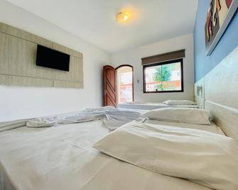 Pousada Porto do Rio Praia - Caraguatatuba - Bedroom
