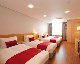 Ramada by Wyndham Seoul Dongdaemun - סיאול - חדר שינה