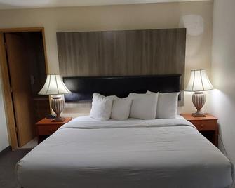 Lavissh inn and Suites - בלינגהאם - חדר שינה