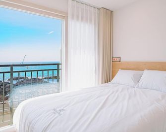 Jeju Mon Dieu Hotel - Jeju City - Bedroom