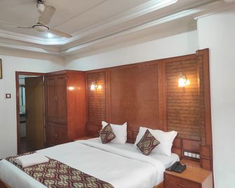 Hotel Ambarish Grand Residency - Guwahati - Bedroom
