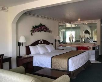 Garden Inn & Suites - Pine Mountain - Slaapkamer