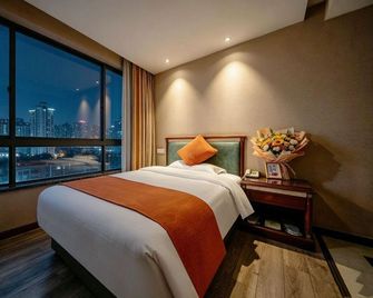 Jiahe Business Hotel - שי-אן - חדר שינה