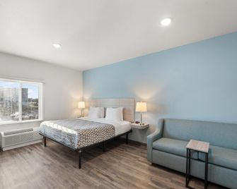 Woodspring Suites Jackson Pearl I-20 - Pearl - Ložnice