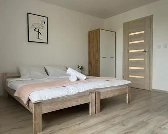 Land House - Zator - Sypialnia