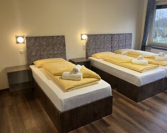 M&M Hotel - Seevetal - Seevetal - Спальня