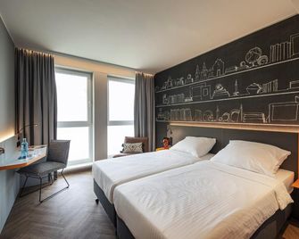 Loginn Hotel Köln Airport - Köln - Schlafzimmer