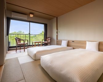 Kamenoi Hotel Okunikko - Nikkō - Schlafzimmer