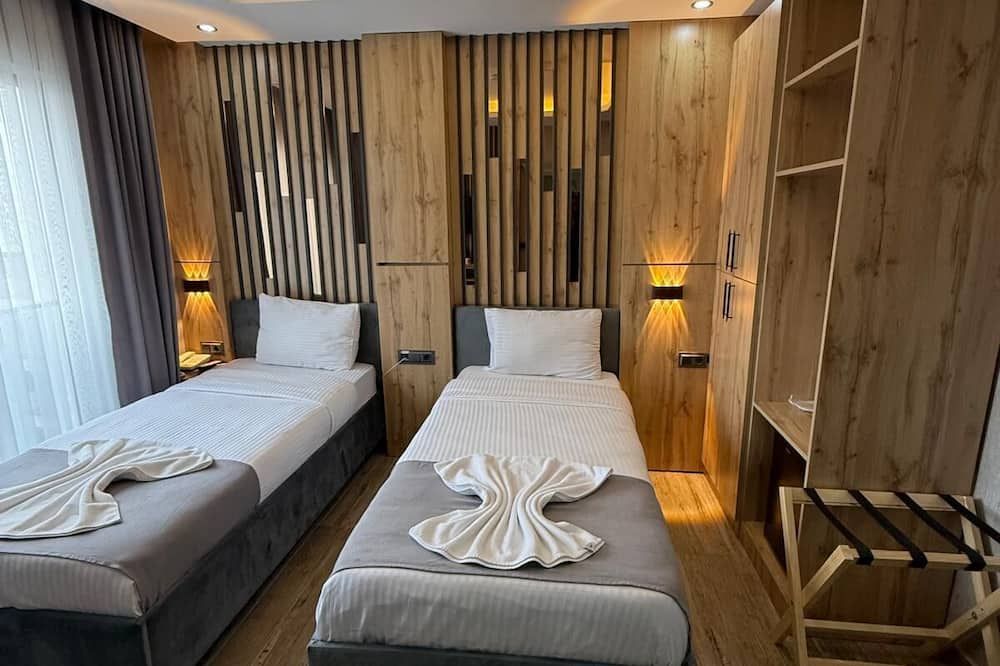 وورلد ساي هوتل - فان - غرفة نوم