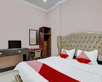 Hotel O Rindu Sempadan Near Taman Wisata Rindu Sempadan - Pekanbaru - Bedroom