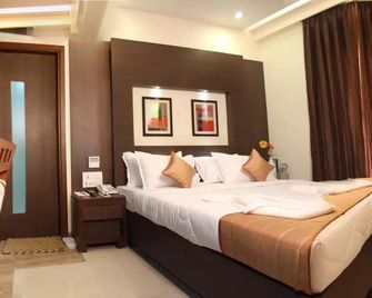 بريستين ريزيدينسي - أحمد أباد - غرفة نوم