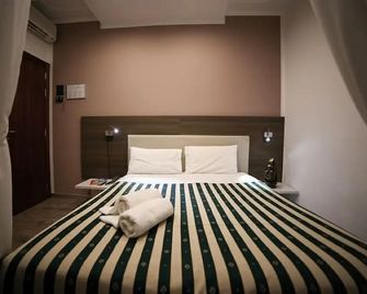 Hotel Santa Lucia - Bibione - חדר שינה