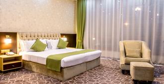 Megapolis Hotel Shymkent - Shymkent - Bedroom