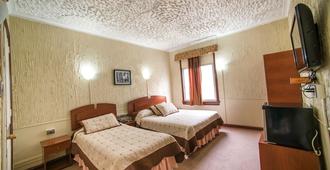 Hotel Sahara Inn - Santiago de Chile - Schlafzimmer