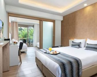 Poseidon Resort Hotel - Néos Marmarás - Chambre