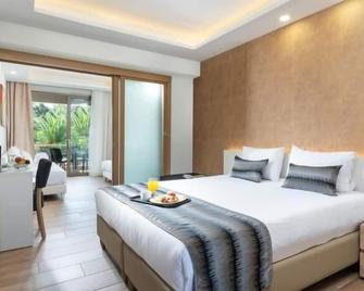 بوسيدون ريزورت هوتل - نيوس مارماراس - غرفة نوم