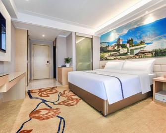 Shengjing Yijia Hotel - Shiyan - Schlafzimmer