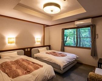 Hakone Onsen Sanso Nakamura - האקונה - חדר שינה