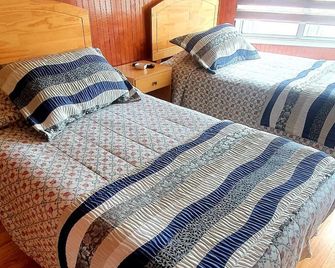 Hostal Galvarino Puerto Natales - פוארטו נטאלס - חדר שינה