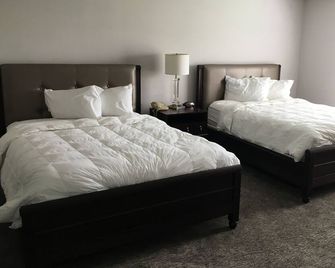 Ambassador Inn And Suites - Manchester - Спальня