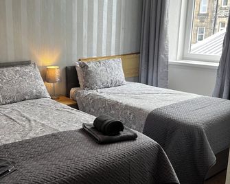Dunarle Guesthouse - אובן - חדר שינה