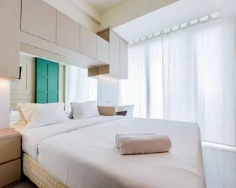 Cozy Stay Studio At Tree Park City Bsd Apartment By Travelio - Tangerang City - Bedroom