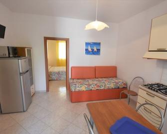 Appartamenti Doria I - Lido degli Estensi - Sala de estar