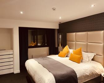 أوتيل لو بانوراما - Le Mont-Dore - غرفة نوم