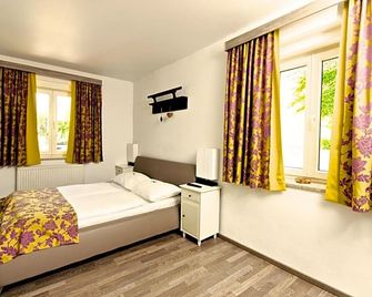 Zur Steirerstub'n - غراتس - غرفة نوم