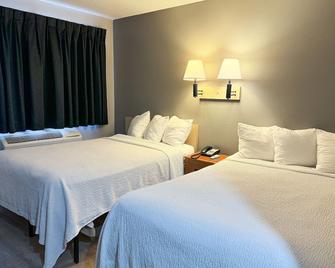 Super 7 Motel - Coralville - Schlafzimmer