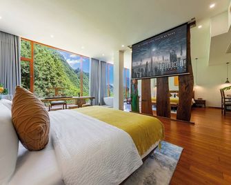 Huagu Jianzhu Guesthouse (Zhangjiajie National Forest Park Branch) - Zhangjiajie - Schlafzimmer