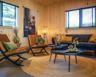 Vakantiehuisje Jipué met sauna en bubbelbad. - Bergentheim - Sala de estar
