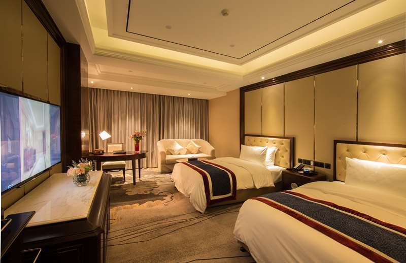 Galactic Garden International Hotel - נאנצ'אנג - חדר שינה