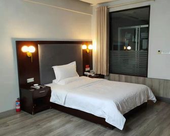 Taihe Xuanwu Hotel - Shiyan - Camera da letto