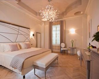 Grand Hotel da Vinci - צ'זנאטיקו - חדר שינה