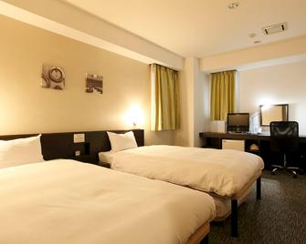 Business Hotel Sunpu - Shizuoka - Sypialnia