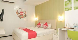 Ebizz Hotel - Jember - Bedroom