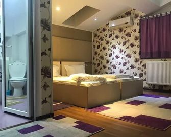 Hotel La Gil - בוקרשט - חדר שינה