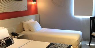 Sumo Asia Hotels - Davao - Davao City - Bedroom