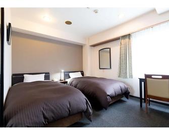 Hotel Yutaka Wing - Tajiri - Bedroom