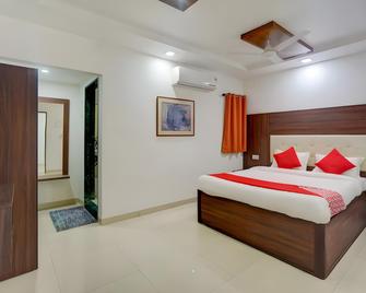 Hotel Ayaansh - Vadodara - Slaapkamer