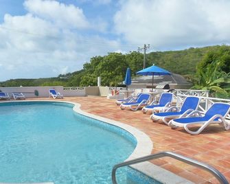 Dickenson Bay Cottages - Cedar Grove - Pool