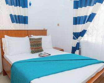 Ashanti Heritage Lodge - Кумасі - Спальня