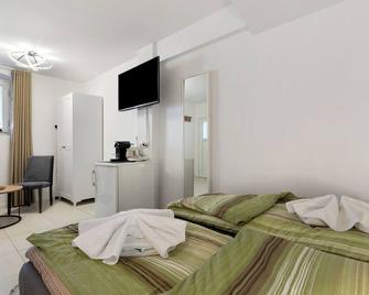 Apartment '2, 20qm' with Shared Terrace and Wi-Fi - Rheinhausen - Chambre