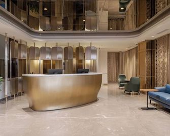 The Magnus - Koimbatur - Salónek