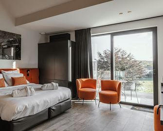 CC Nomie Hôtel Restaurant - Dinant - Schlafzimmer