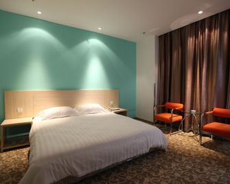 Chizhou 168 Hotel (Cuibai Road) - Chizhou - Bedroom